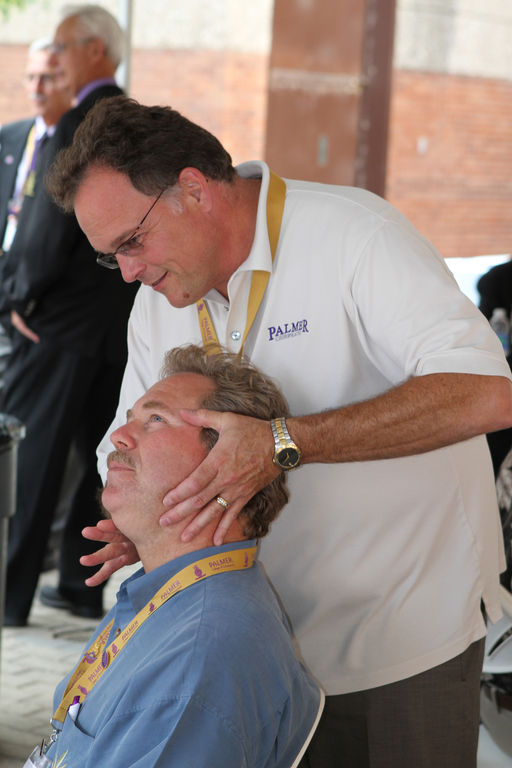 Dr. Rusty L. Myers adjusting a patient